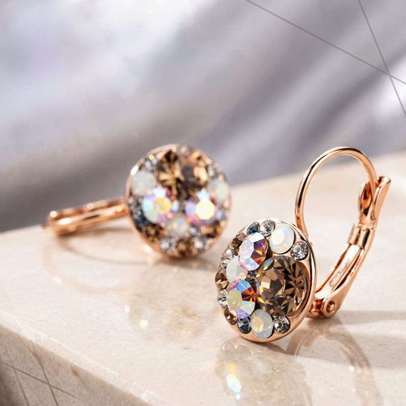 zlaté visiace náušnice swarovski
